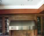 Art Scrolling over Kitchen Cabinets